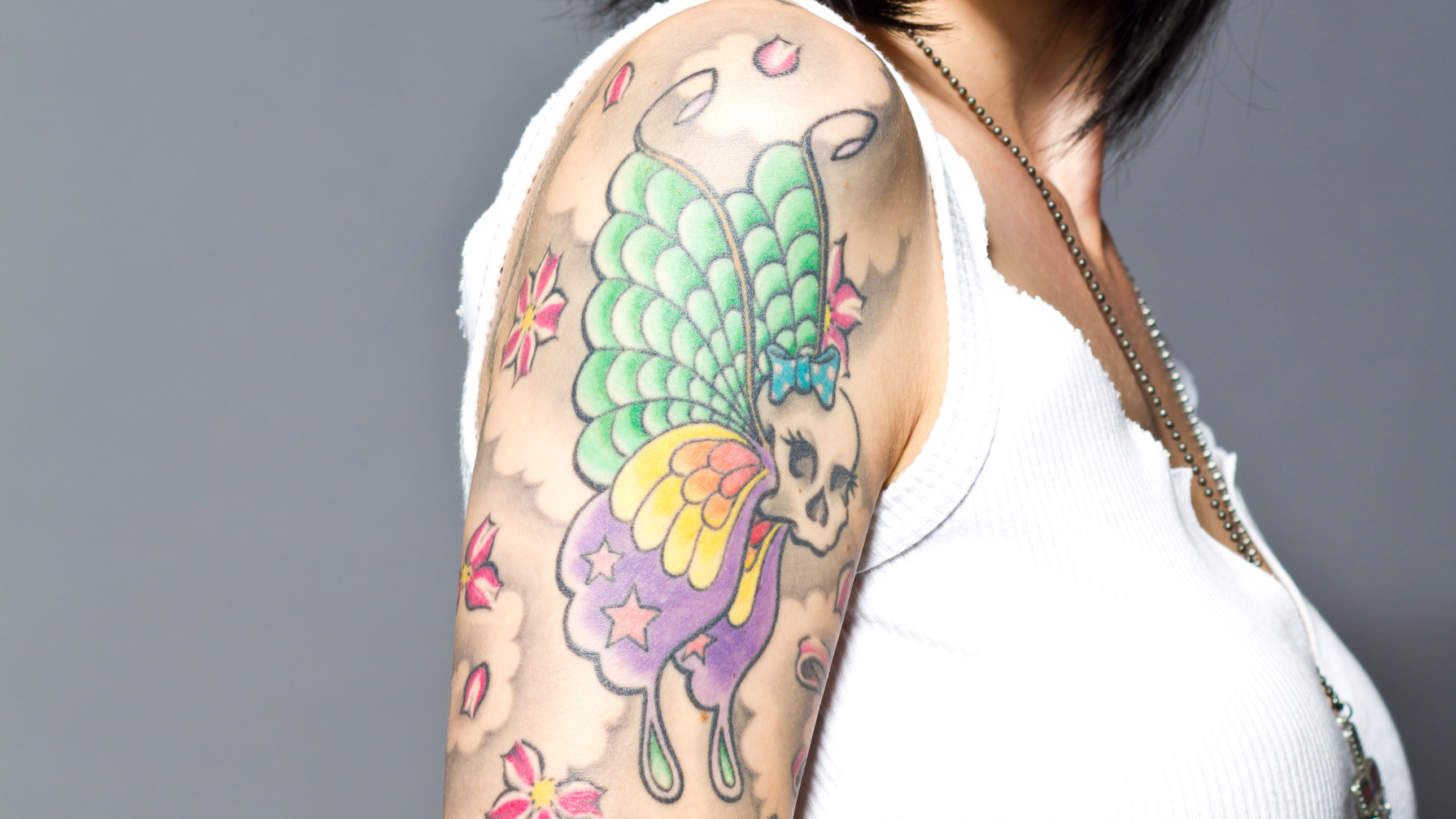 Fill in the blank: This LV tattoo is… - PurseBlog